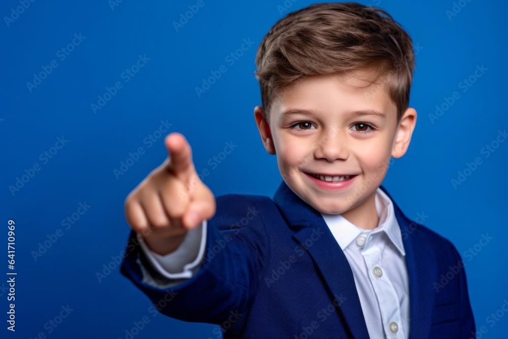 Medium shot portrait photography of a joyful kid male pointing with two hands and fingers to the side against a periwinkle blue background. With generative AI technology Medium shot portrait photography of a joyful kid male pointing with two hands and fingers to the side against a periwinkle blue background. With generative AI technology