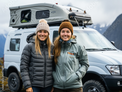 two woman travel with camper