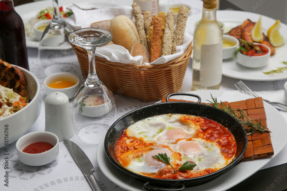 Italian shakshuka - Poached eggs in tomato sauce - a healthy one-pan meal Italian shakshuka - Poached eggs in tomato sauce - a healthy one-pan meal