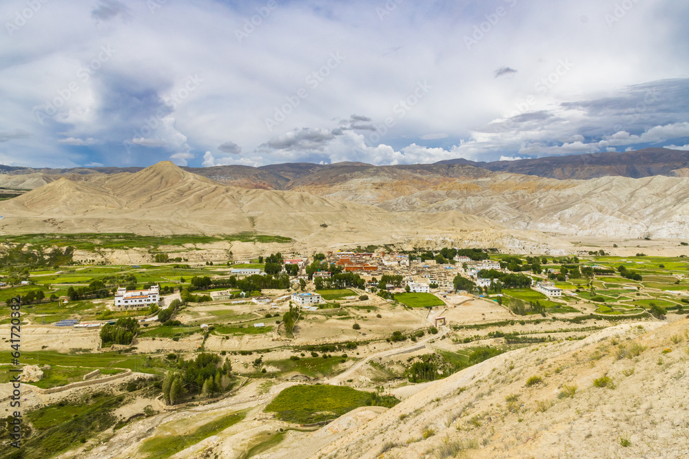 Landscape view of Kingdom of Lo Manthang with Green Tibetan Desert Background in Mustang of Nepal