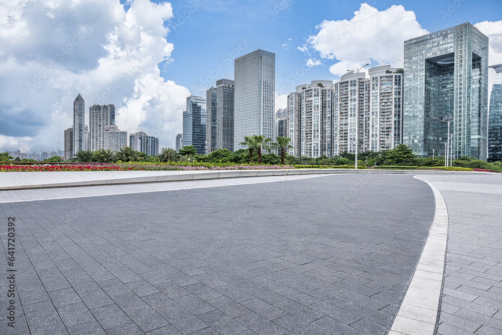 Empty square floor and city skyscrapers landscape in Guangdong, China - obrazy, fototapety, plakaty 