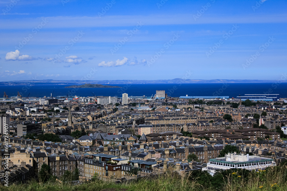The high angle view of Edinburgh landscape from the mountain where near the National Monument of Scotland, England, UK. Cityscape of Edinburgh. Travel and nature scene.