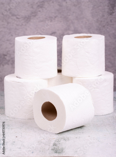 Toilet paper. Toilet paper rolls on gray background