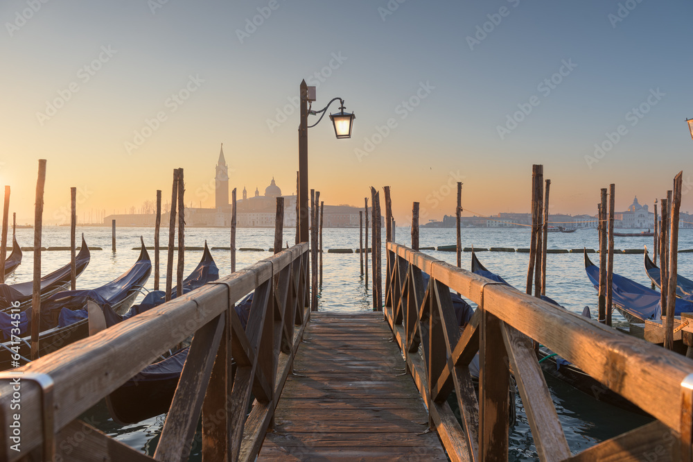 Gondolas in Venice, Italy at dawn on the Grand Canal Gondolas in Venice, Italy at dawn on the Grand Canal