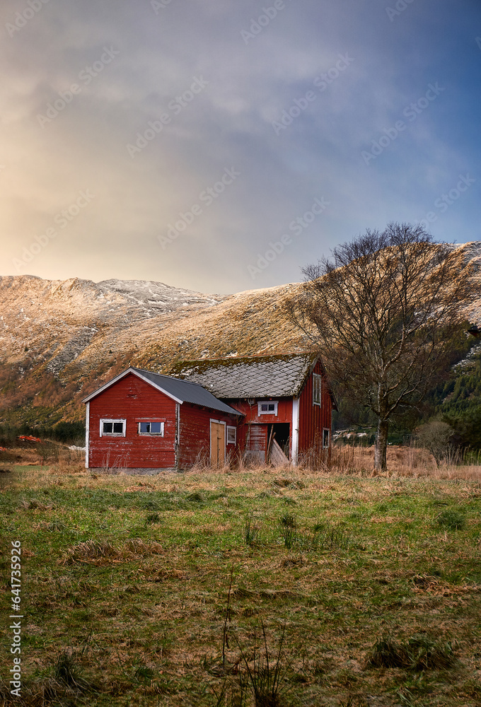 Beautiful old cabin during sunset on Godøy, Ålesund, Norway