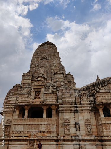 Picture of Meera temple at Chittorgarh Fort shot against blue sky and white clouds during daylight