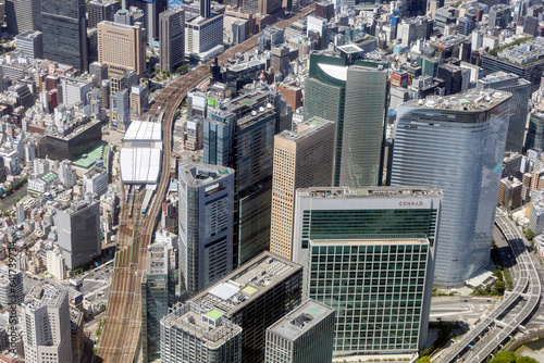 新橋駅と汐留の高層ビル群を空撮 photo