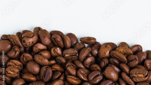 Coffee beans with spoon and glass ready to be served