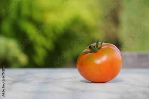 tomato on a marble table