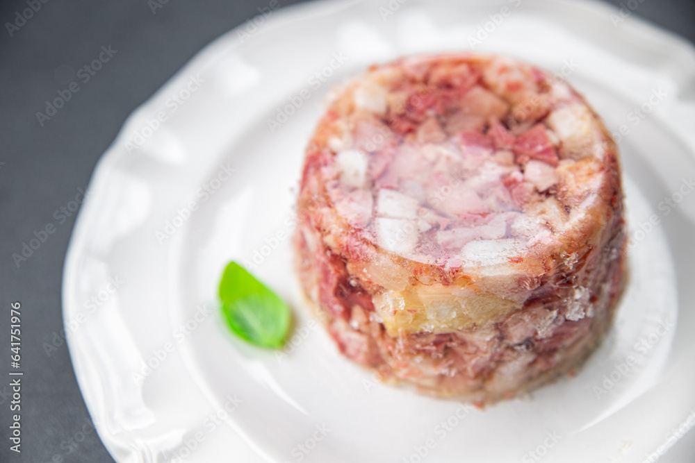 meat brawn food Sülze pieces of meat in jelly pork, beef meat product ready to eat meal food snack on the table copy space food background rustic top view meat brawn food Sülze pieces of meat in jelly pork, beef meat product ready to eat meal food snack on the table copy space food background rustic top view