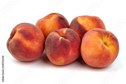 Fresh peaches, isolated on white background.
