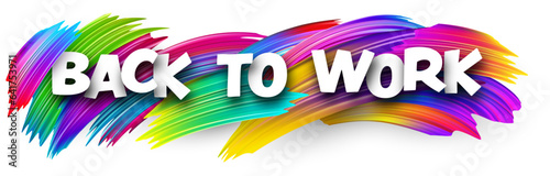 Back to work paper word sign with colorful spectrum paint brush strokes over white.