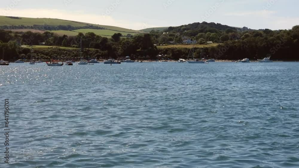 Boats moored in Studland Bay Dorset United Kingdom Boats moored in Studland Bay Dorset United Kingdom