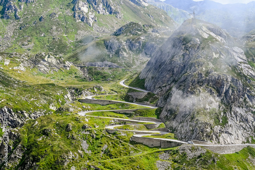 Tremola, Passstrasse, Gotthardpass, Gotthardpassstrasse, Gotthard, Bergstrasse, Pflastersteine, Airolo, Schweizer Alpen, Alpen, Sommer, Tessin, Schweiz, Reiseverkehr, Stau photo