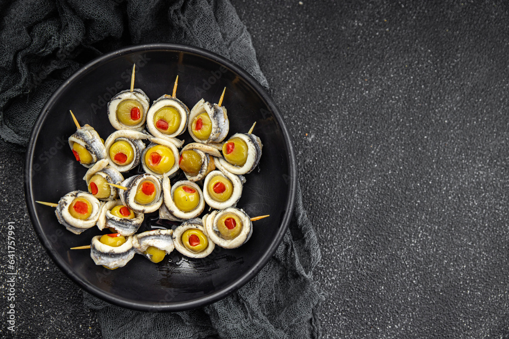 olive stuffed anchovy fillets, anchovy roll stuffed olives apetizing seafood pickled fish
