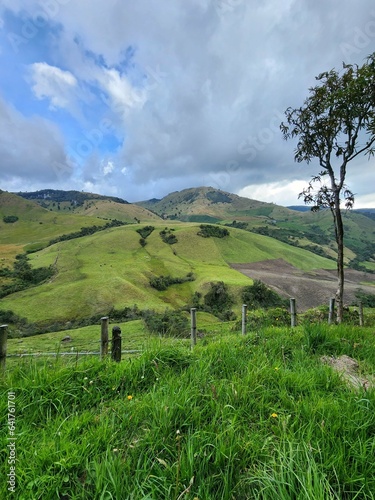 Landscape in Villamaria, Caldas, Colombia with green montains, moorland and road to the ruiz hot springs