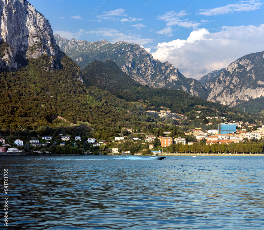Panorama of Alpine Lake Como against the backdround of the Alps located in the Lombardy region in northern Italy. 
