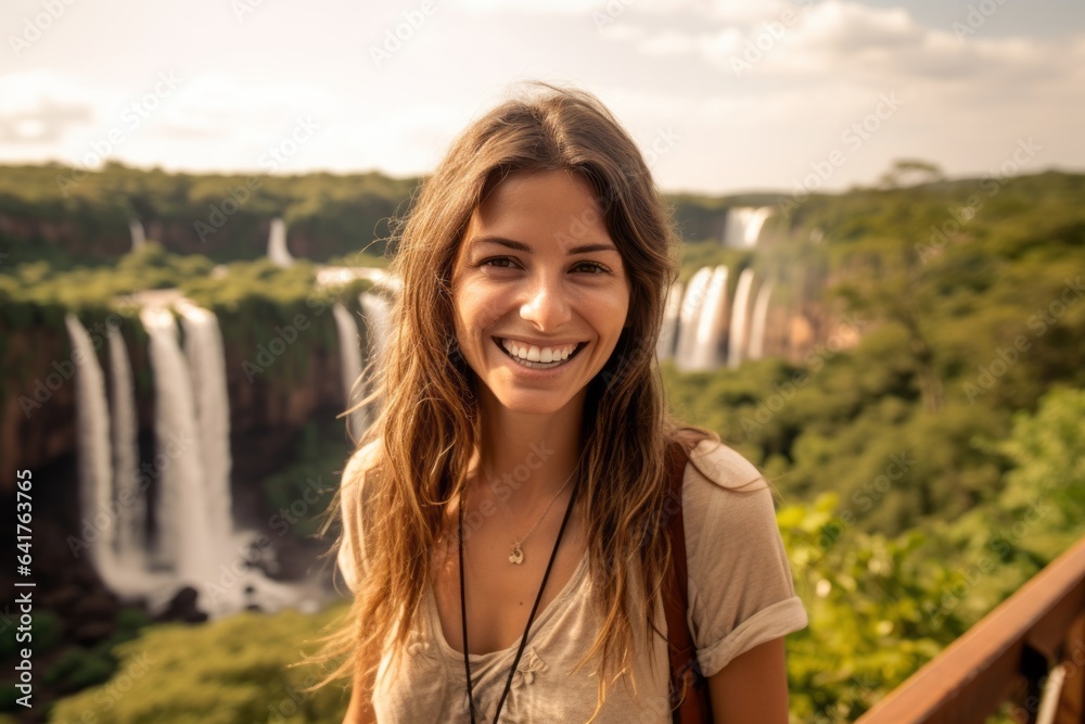 Medium shot portrait photography of a cheerful girl in her 40s wearing a trendy cropped top at the iguazu falls argentina-brazil border. With generative AI technology Medium shot portrait photography of a cheerful girl in her 40s wearing a trendy cropped top at the iguazu falls argentina-brazil border. With generative AI technology