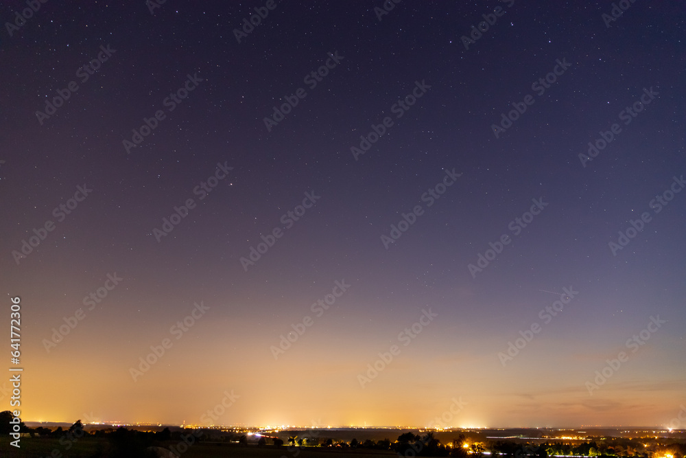 Stars sky with Milky Way in front of a forest Stars sky with Milky Way in front of a forest
