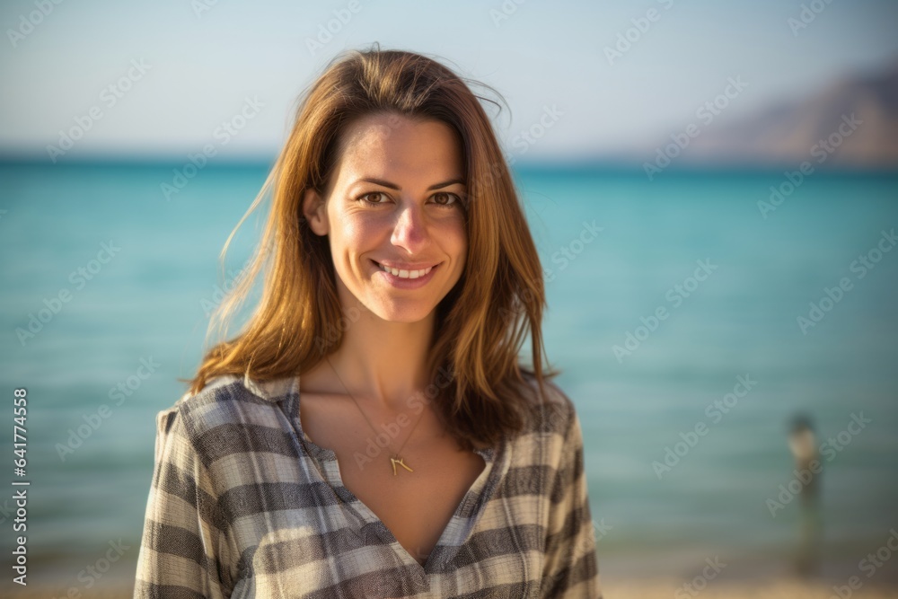 Headshot portrait photography of a content girl in her 40s wearing a trendy off-shoulder blouse at the dead sea in israel/jordan. With generative AI technology Headshot portrait photography of a content girl in her 40s wearing a trendy off-shoulder blouse at the dead sea in israel/jordan. With generative AI technology