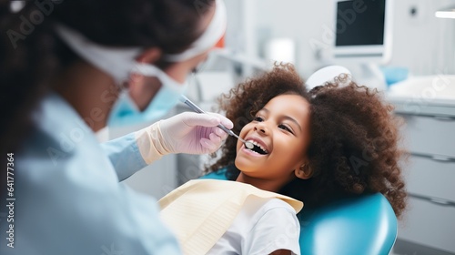 Happy african kid happy on dental chair after repairing tooth, kids on dentist, easy moment