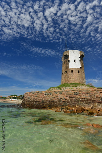 Le Hocq tower, Jersey, U.K. 19th century Napoleonic tower on a beautiful Summer coastline. photo