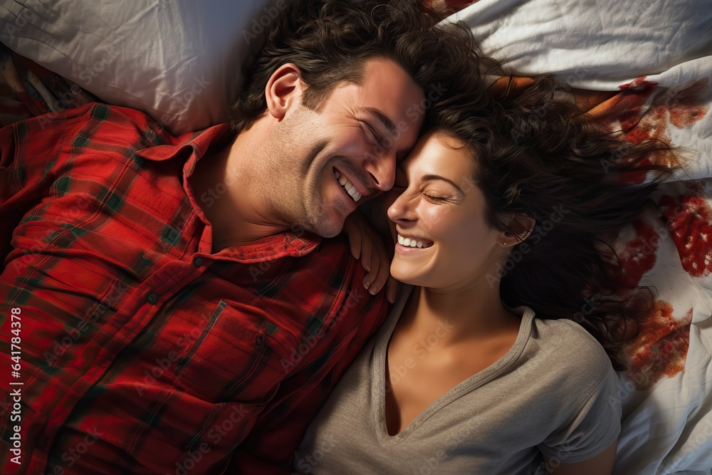 High angle view of beautiful happy young couple hugging , candid bonding moment, laughing lovely High angle view of beautiful happy young couple hugging , candid bonding moment, laughing lovely