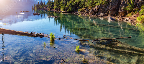 Glacier Lake with trees and Canadian Mountain Landscape. Garibaldi Lake, Whistler, BC, Canada. photo