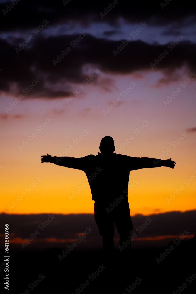 Man in a sunset at White and Black Desert, Egypt