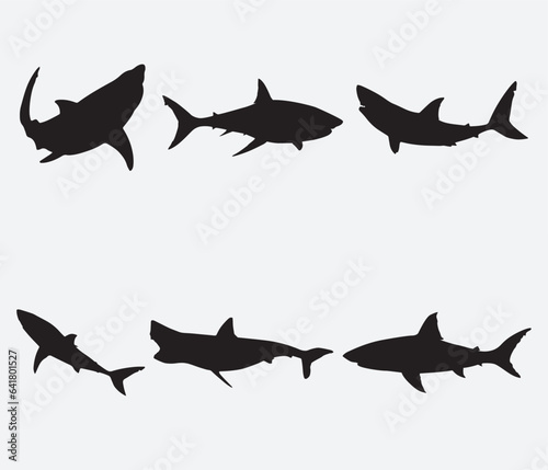 Shark silhouettes set.. Vector illustration © tabon