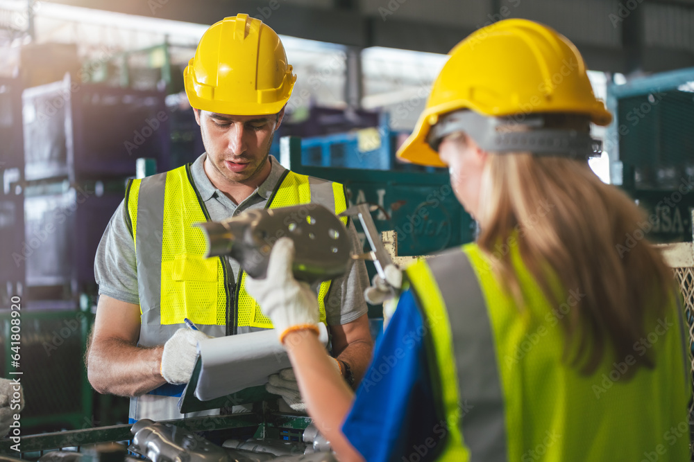 Group of Diverse Warehouse Workers Working Together to Quality Control in Factory, Industrial Management and Teamwork for Optimal Efficiency. Group of Diverse Warehouse Workers Working Together to Quality Control in Factory, Industrial Management and Teamwork for Optimal Efficiency.