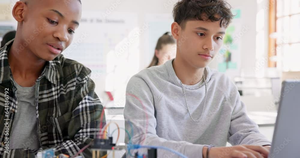 Robotics, education and students with laptop at school learning coding, future or programming. Teenager children in class for technology, electronics or science as development, innovation or teamwork