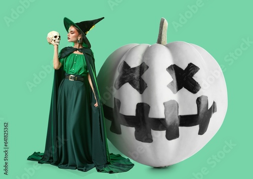 Young witch with skull and ...