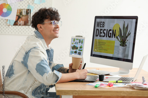 Male graphic designer with ...