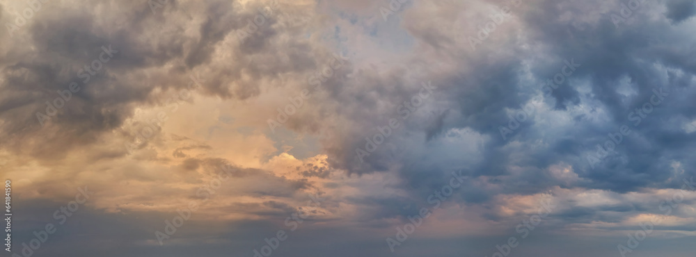 Panorama of the cloudy sky in the evening. High resolution cloud texture