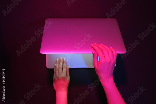 Woman working with modern l...