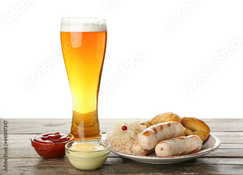 Glass of cold beer, plate w...