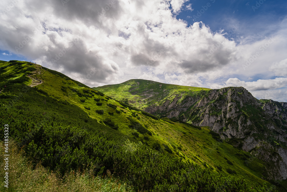 Mountain landscape in Zakopane Tatras in summer, sky in clouds. Mountain landscape in Zakopane Tatras in summer, sky in clouds.