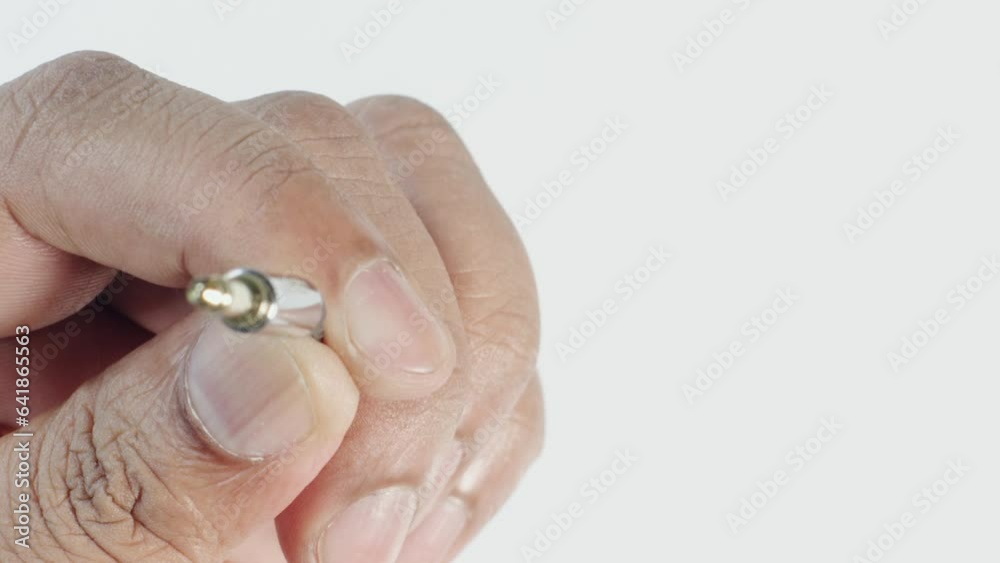 Auxillary Headphone Cable In Hand Auxillary Headphone Cable In Hand