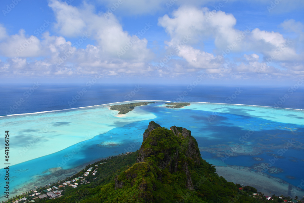 Paradise view on pacific ocean (turquoise lagoon) in Maupiti | French Polynesia