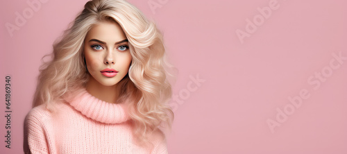 Young Girl blonde in knitted warm sweater portrait isolated on flat background with copy space. Knitted natural clothing store banner template. Autumn fashion collection. 