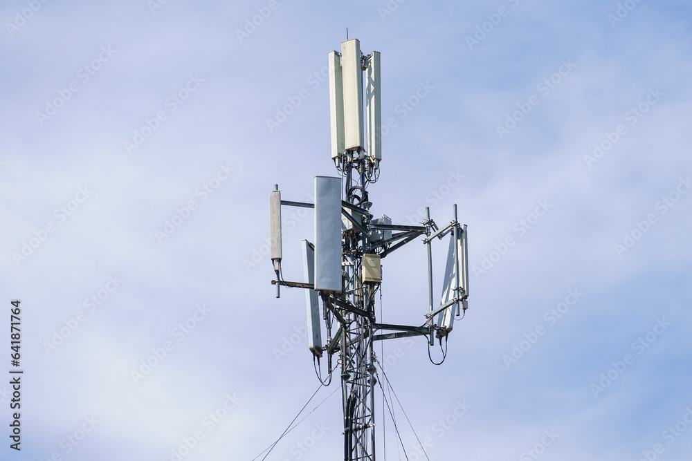 Telecommunication tower with blue sky background. Technology and communication Telecommunication tower with blue sky background. Technology and communication