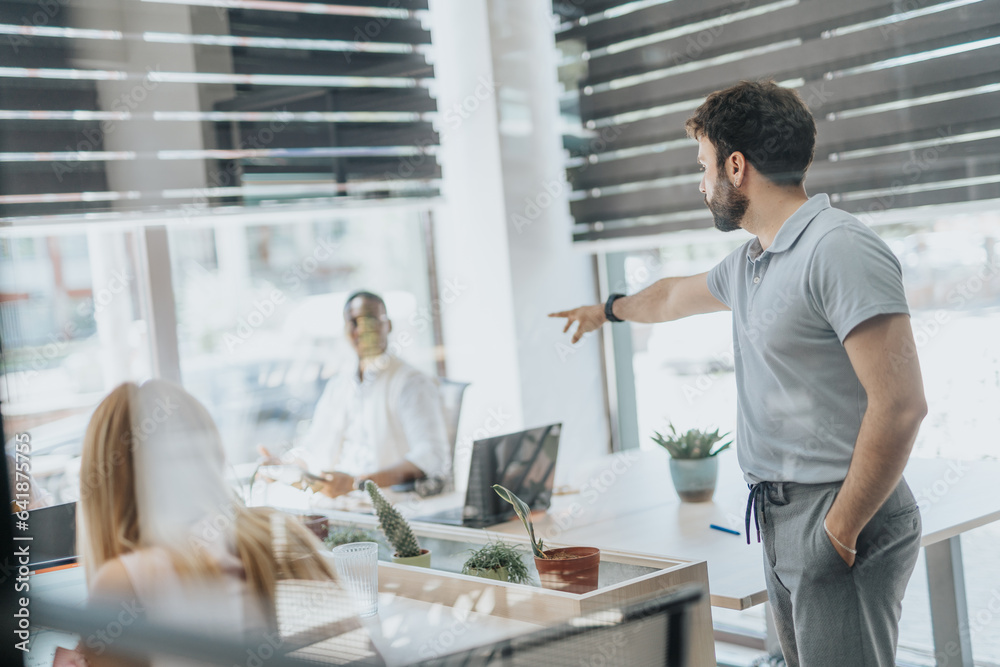 Businessman pointing and blaming an employee for not successful finished job. Businessman pointing and blaming an employee for not successful finished job.