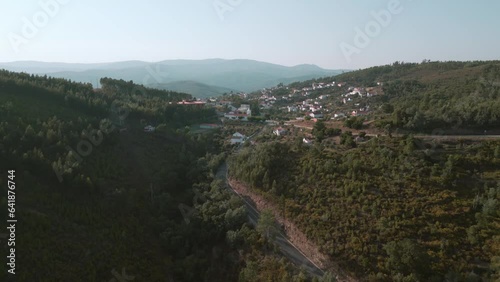 Drone view of a Portuguese village in the center of Portugal, with the mountains in the background.