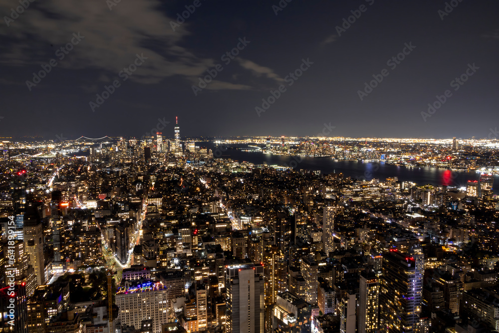 A view from the observatory at the top of the Empire State Building in New York City at night. A view from the observatory at the top of the Empire State Building in New York City at night.