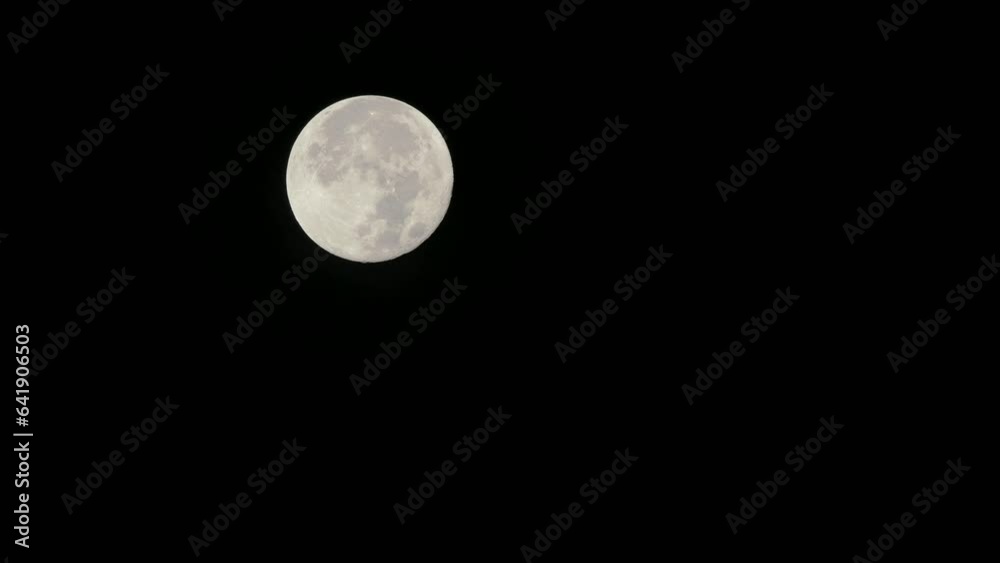 Tokyo, Japan - August 31, 2023: The full moon going down at night
Tokyo, Japan - August 31, 2023: The full moon going down at night