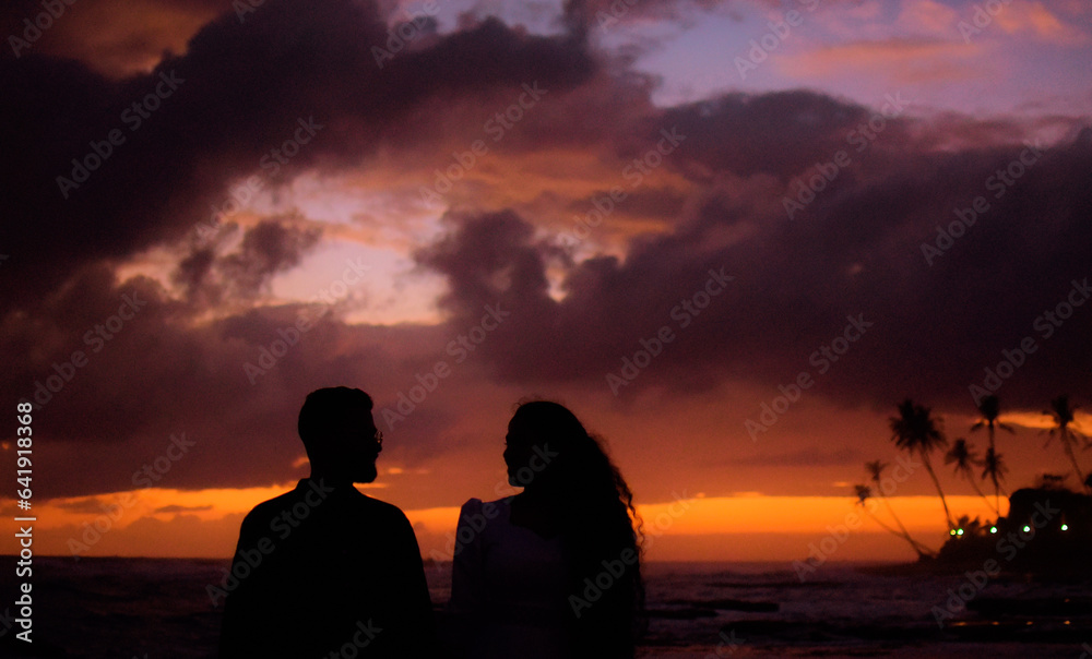 silhouette of a couple on a beach