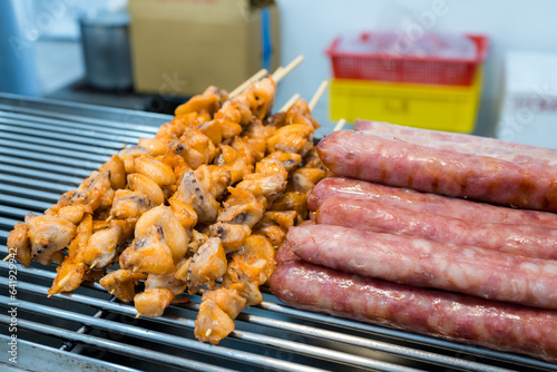 Taiwan sausage and conch skewer at street market