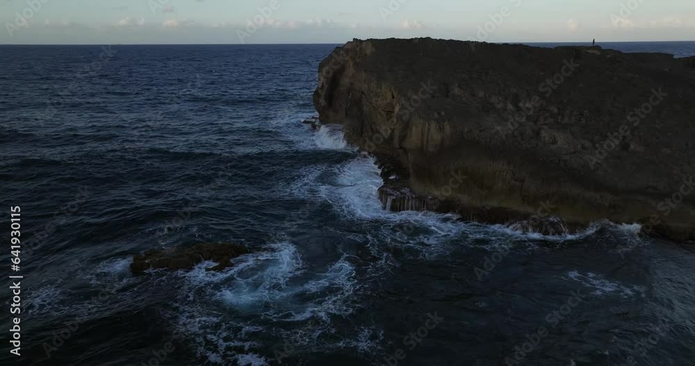 Rocky Shore formation at the Beach on Arecibo Puerto Rico with waves hitting the rocks