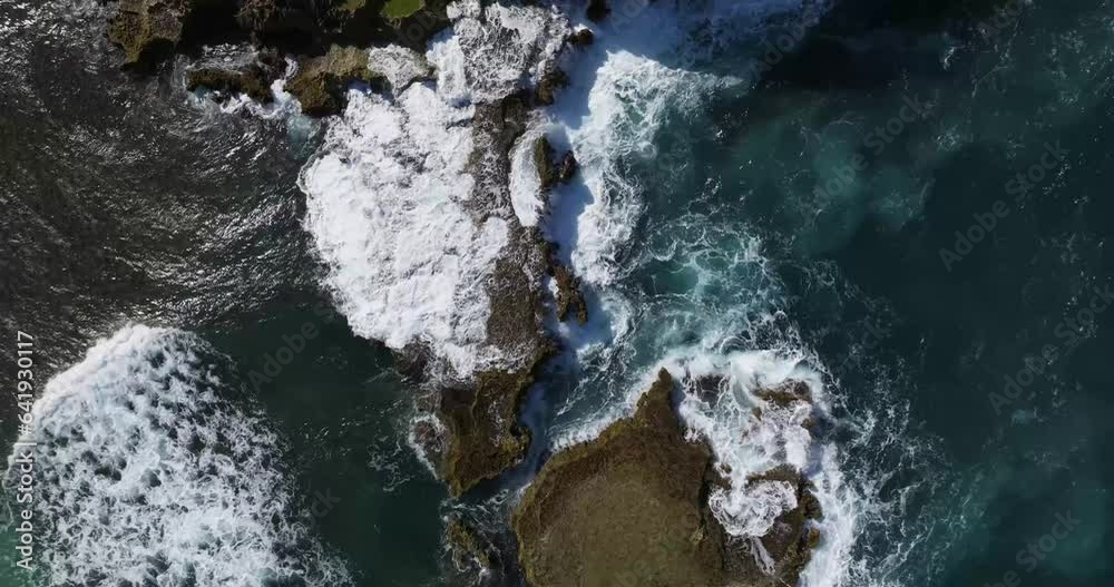 Rocky Shore formation at the Beach on Arecibo Puerto Rico with waves hitting the rocks